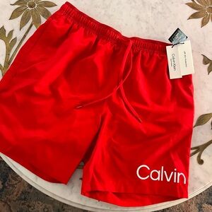 BNWT men’s size Large Calvin Klein red bathing suit. UPF 40+ protection